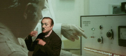 Philip Zimbardo, with slide of shock machine experiment